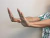 To test for asterixis, the arms are extended and the wrists dorsiflexed. The presence of asterixis is defined as a tremor of the hands with arms extended and wrists held back (dorsiflexed) with failure to hold hands in this position, ideally with eyes closed.